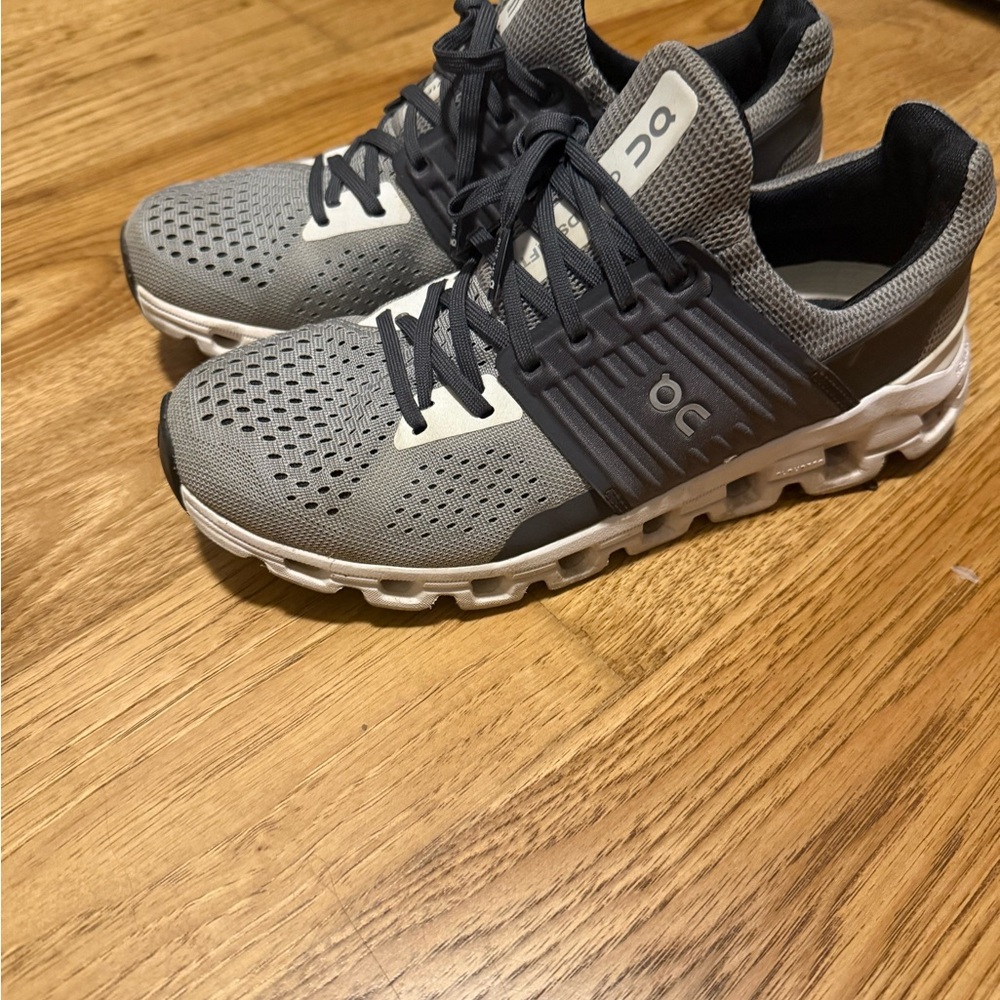 On Running Gray and Black Athletic Shoes